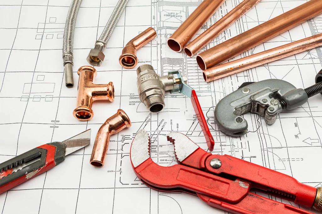 Outils et tuyau réparation fuites